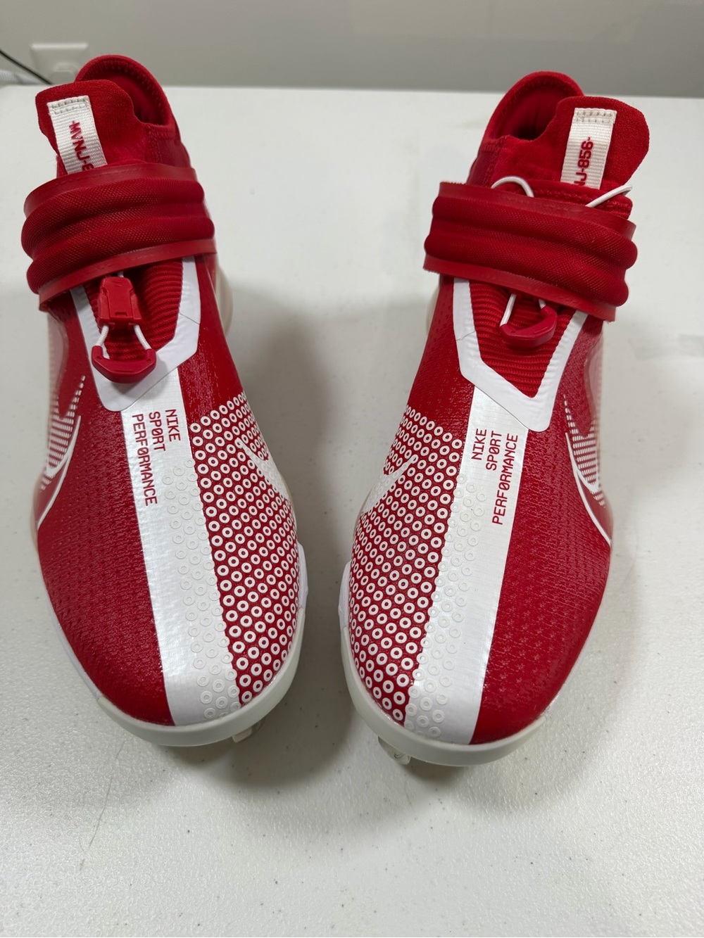 Nike Red and White Sport Performance Cleats by Trout